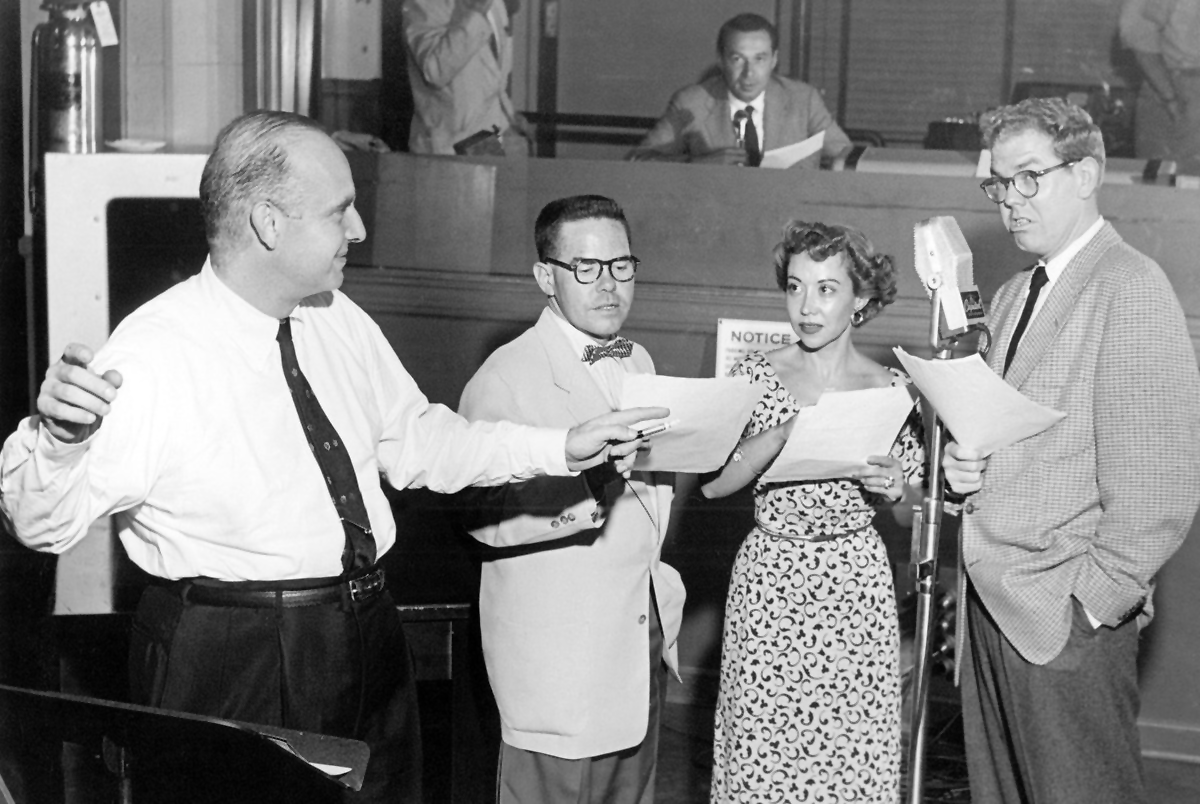 Walter Schumann, left, Daws Butler, June Foray and Stan Freberg recording the album “St. George and the Dragonet” (1953) Capitol Records.