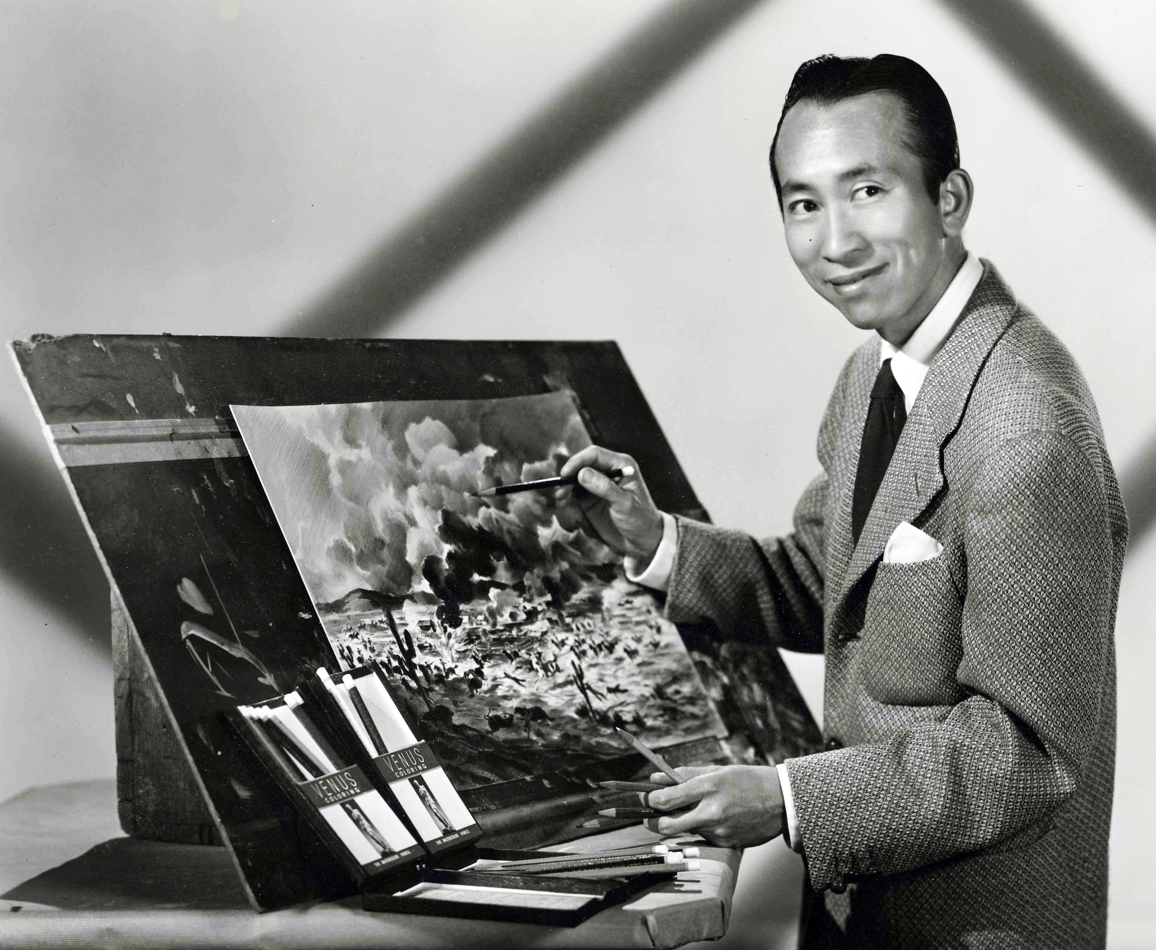 Tyrus Wong working on a Warner Bros western movie production Circa 1940s.