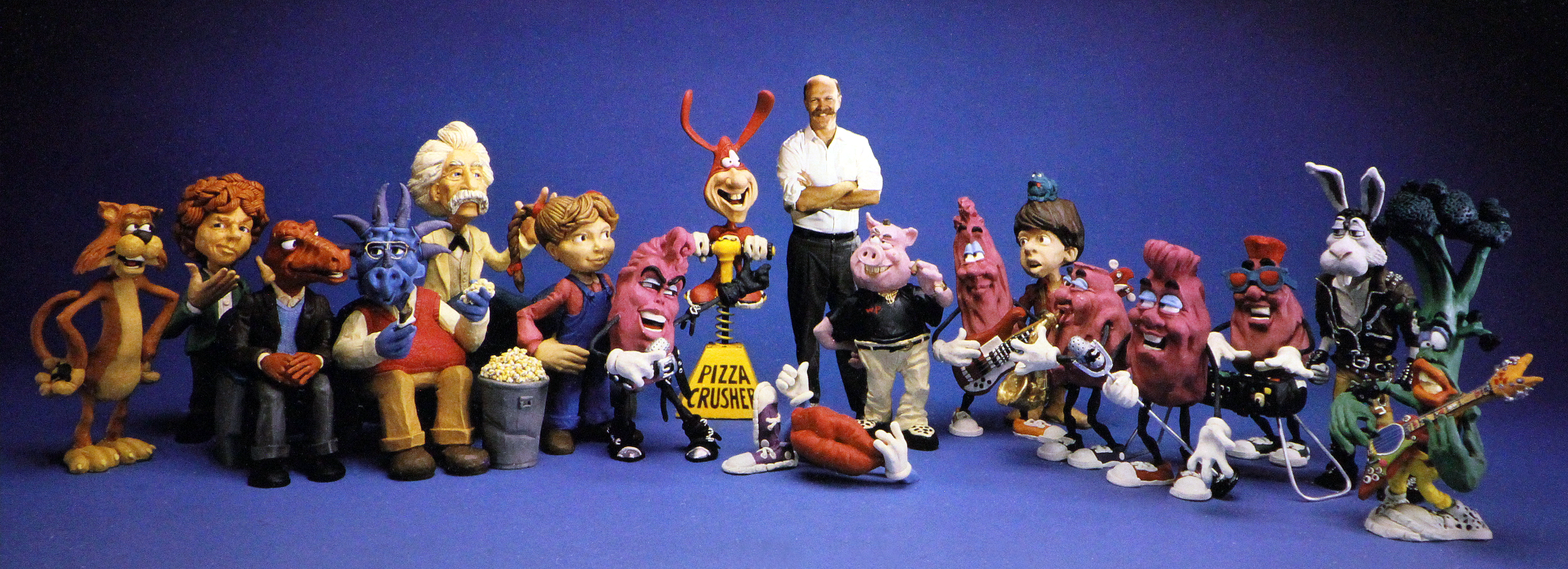 Will Vinton posing with his created characters.